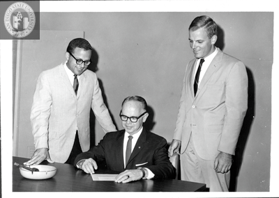 Check signing, student union, 1966