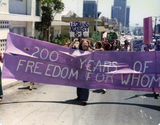 "200 years of freedom for whom" banner at Pride parade, 1976