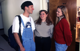 Students at a dormitory room door, 1995